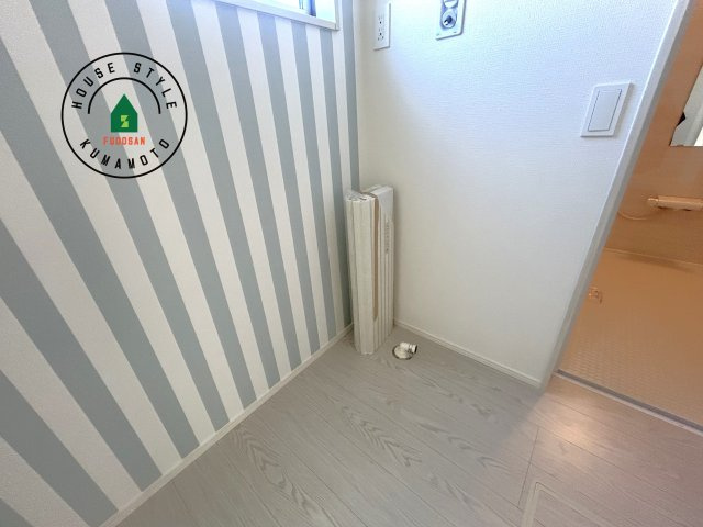 熊本市西区谷尾崎町第1-2棟（1号棟）　の内観：施工例|ランドリースペースとなります。広々して有効的にご使用できます。 