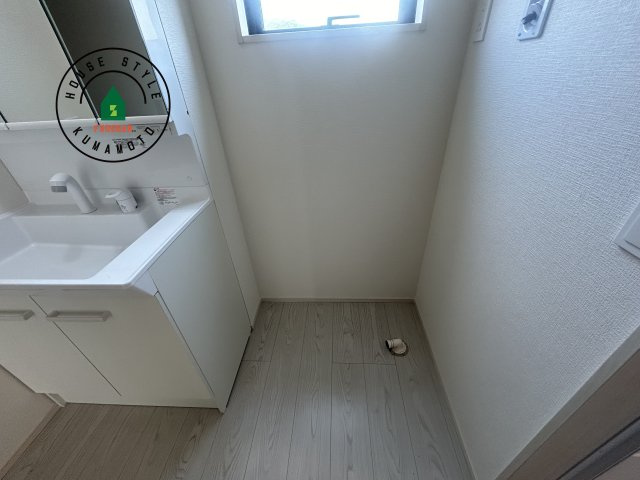 熊本市西区谷尾崎町第1-2棟（2号棟）　の内観：施工例|ランドリースペースとなります。広々して有効的にご使用できます。 