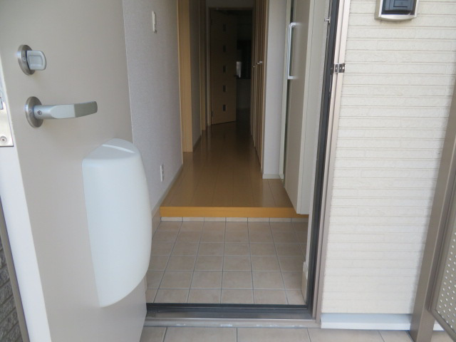 サンリット　レジデンス　社の玄関