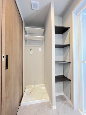 アイランドタワースカイクラブC棟のランドリースペース