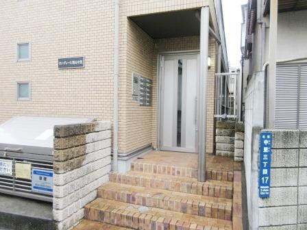 サングレース駒込中里のエントランス