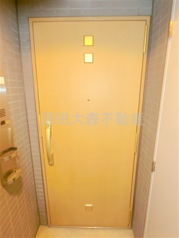 スモールシティハウス平和島の玄関