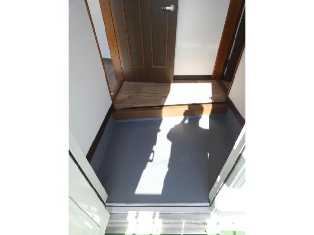 拓穂ハイツ（愛国東２－２１）の玄関