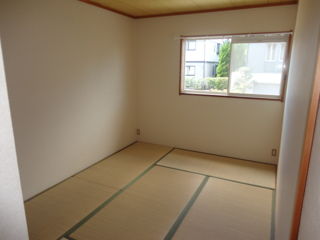 パセオ真美Ａの居間・リビング