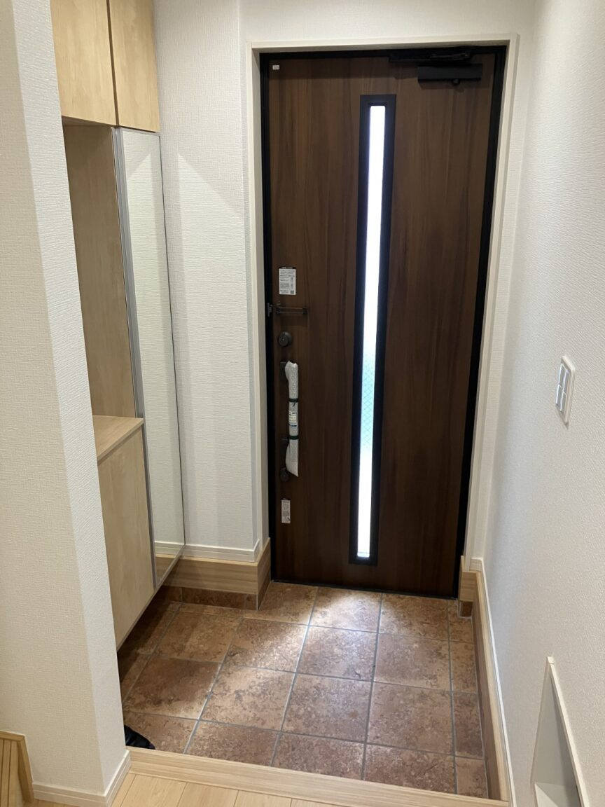 サニータウン高津区溝口３丁目全１棟の玄関