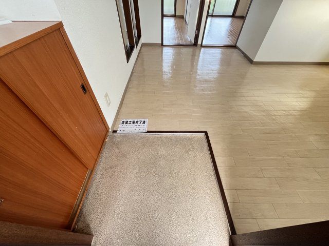 メゾンドクミノキの玄関