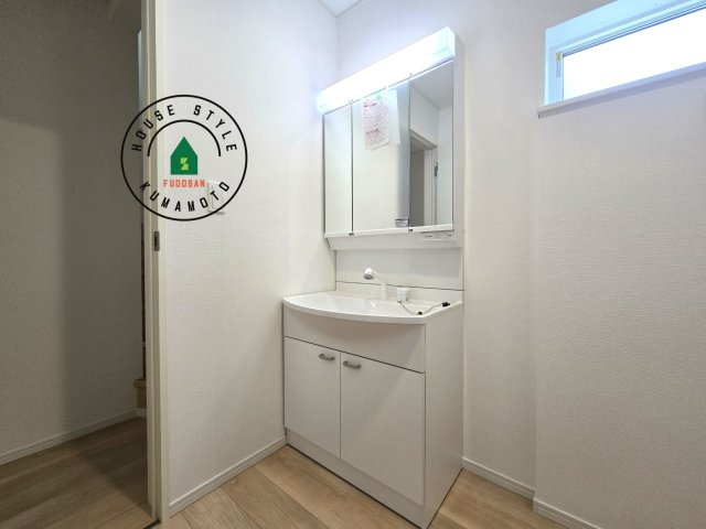 熊本市北区梶尾町第9-3棟（3号棟）の内観：施工例|洗面所は小さなプライベートスペース。歯磨き、洗顔と毎日施す個人空間。