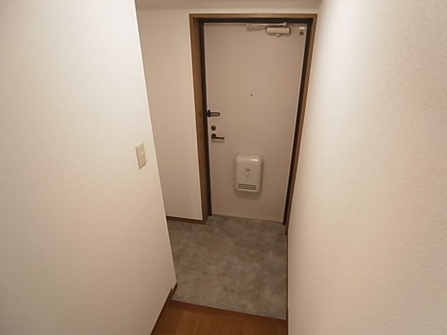 神戸市兵庫区駅前通３丁目の賃貸マンションの玄関