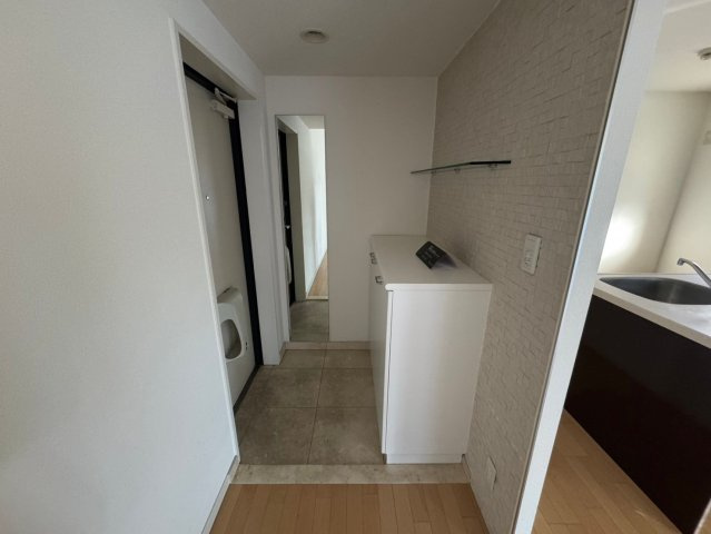 豊中市西泉丘３丁目の賃貸マンションの玄関