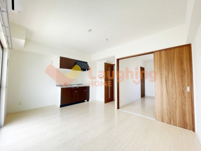 【居間・リビング】 | エスペランサ久留米駅前 | 反転のタイプの間取りの写真を使用しております。