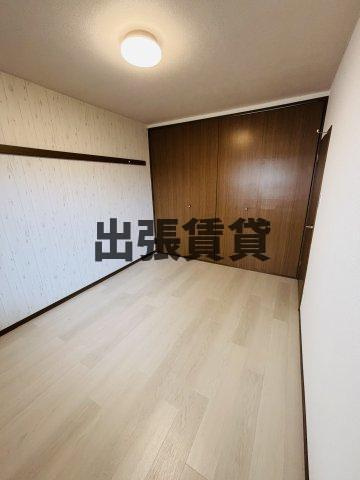 ヴィラ晃梅の洋室