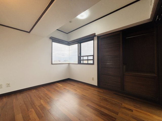 〇ファイン宜野湾の洋室