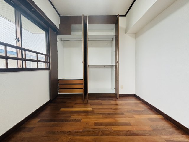 〇ファイン宜野湾の洋室