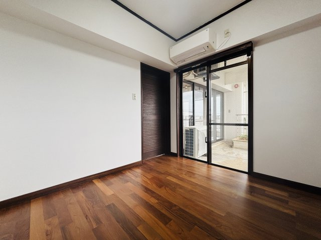 〇ファイン宜野湾の洋室