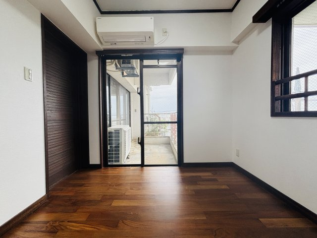 〇ファイン宜野湾の洋室