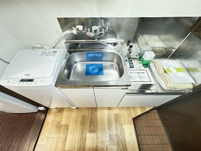 川崎市多摩区菅３丁目のアパートのキッチン