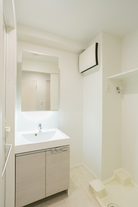 新品家具付きマンション博多駅東27(KaGood福岡)の洗面所