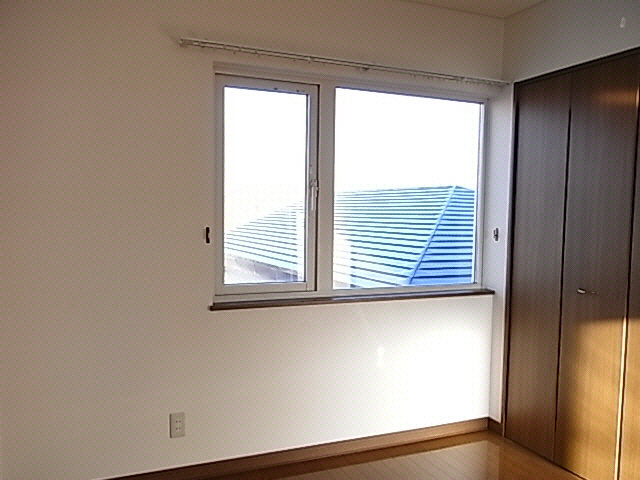 ハピネス富士見スカイハイツの洋室