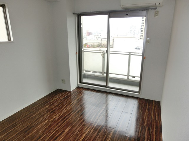 大阪市淀川区十三本町２丁目の賃貸マンションの洋室