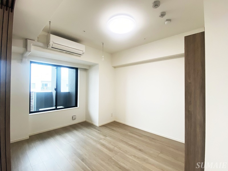 Neo Urban Residence Komagomeの寝室|落ち着いた色調の寝室です