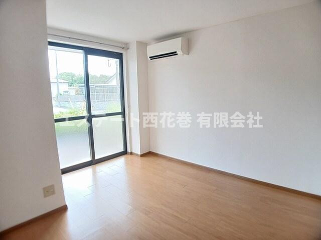 パームハイツ高田A棟の居間・リビング