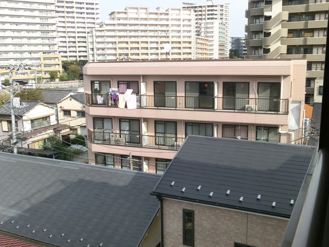 リバーサイドシティの外観|きれいなタイル貼りの賃貸マンションです。