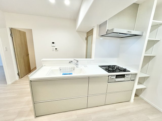 寝屋川コーポラスのキッチン|コンパクトなキッチンで掃除もラクラク