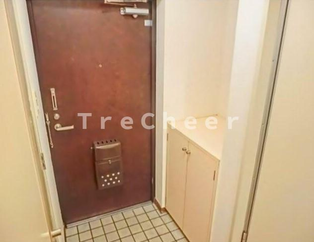 シティーオオソネ21の玄関