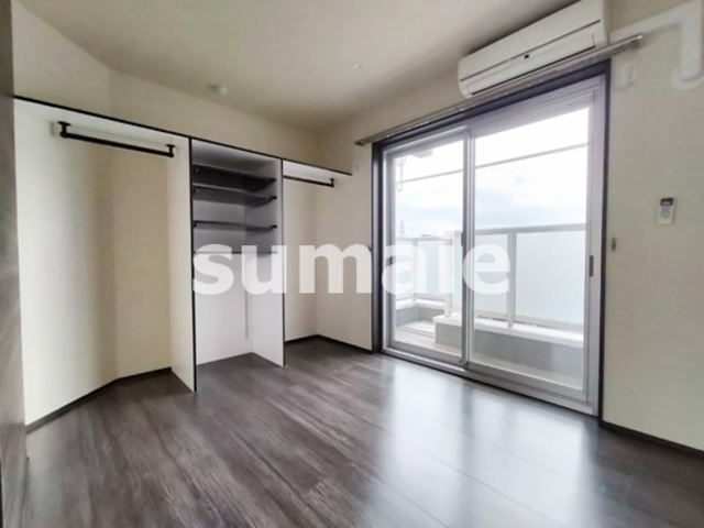 エトワール大成町の寝室|落ち着いた印象のお部屋です。