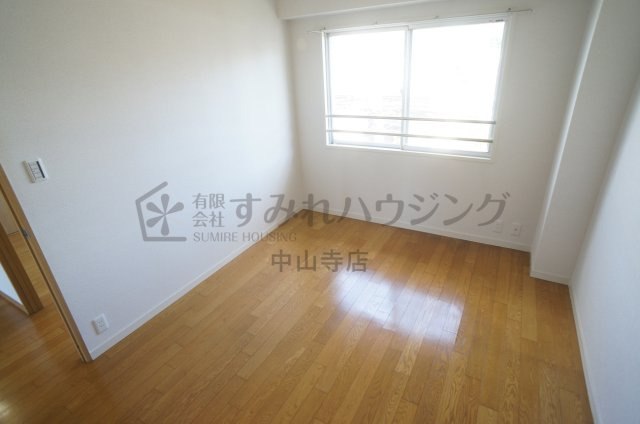 カーサ小浜の寝室