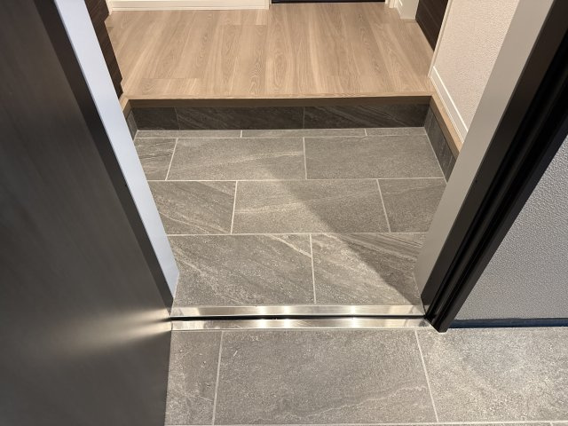 カーサグラス　エステの玄関