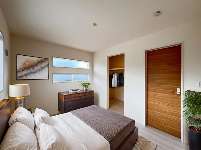 大和高田市西坊城全5棟の寝室|寝室６帖　WIC付き　この家具はAI生成によって配置されたものです