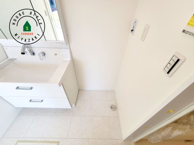 宮崎市島之内(2号棟)の内観：施工例|ランドリースペースとなります。広々して有効的にご使用できます。 