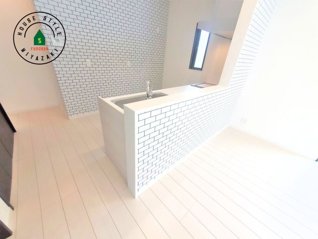 宮崎市下田島栄町(A号地)の内観：施工例|キッチンから立ち込める香りが今日の料理を期待させます。