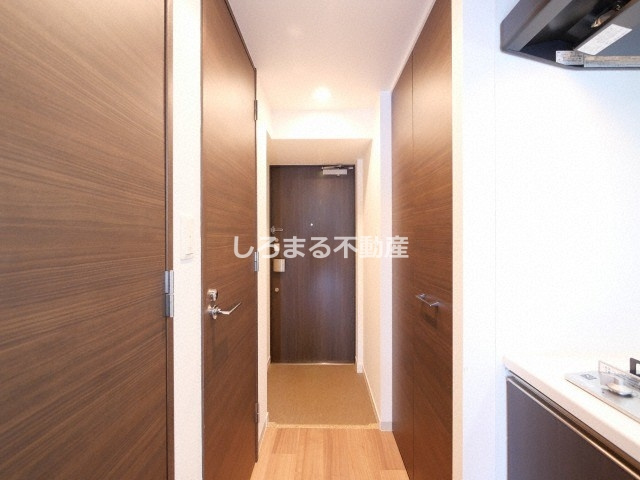 エス・キュート京町堀の玄関