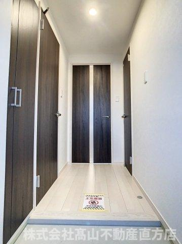 レジェンド直方二番館の玄関