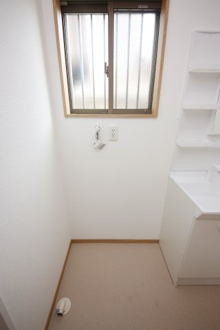メゾン村建の洗面所