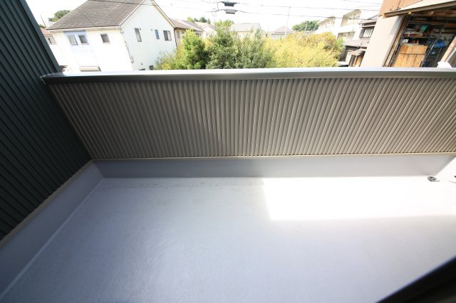 メゾン村建のバルコニー