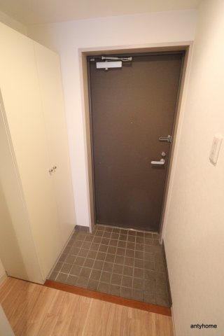 パセオ十三東の玄関