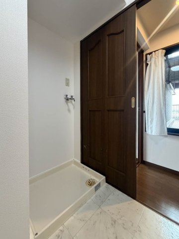 ライオンズマンション築地口弐番館の設備|室内洗濯機置き場です