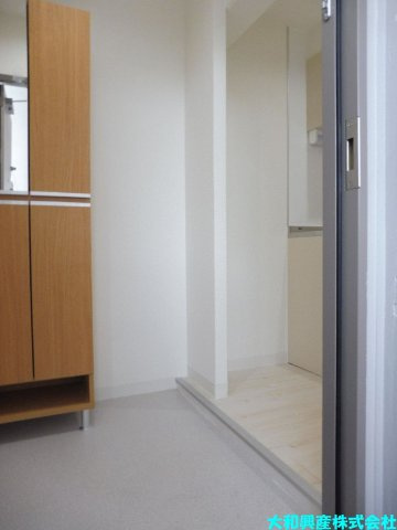 グランコモド小田急相模原の玄関