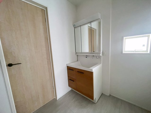 グラファーレ恩納村安富祖　1号棟のランドリースペース