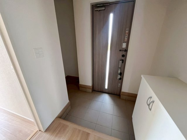 グラファーレ恩納村安富祖　1号棟の玄関|シューズクローク