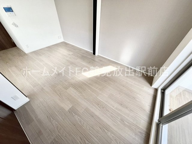 グランカーサ高井田の洋室