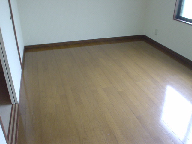 コスモマンションの居間・リビング|洋室