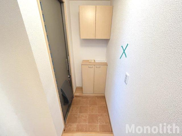 ファミーユ東貝塚の玄関