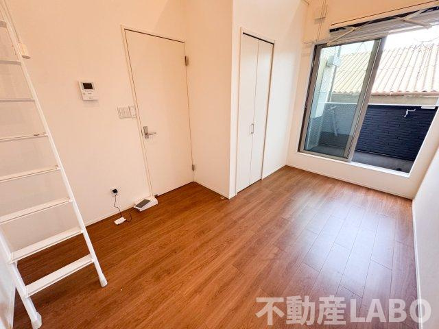 メゾンドボア加美の洋室