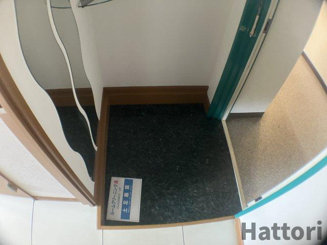 箕面市船場西２丁目の賃貸マンションの玄関