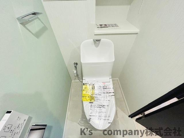 ●茅ヶ崎市今宿　第一ハイツ茅ヶ崎のトイレ|淡いグリーンのアクセントが優しい印象の清潔感のあるトイレ◇