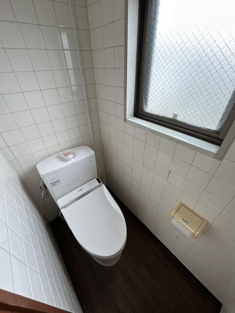 稲城市平尾１丁目の賃貸マンションのトイレ